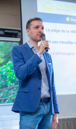 Sylvain Borghiero holding a microphone